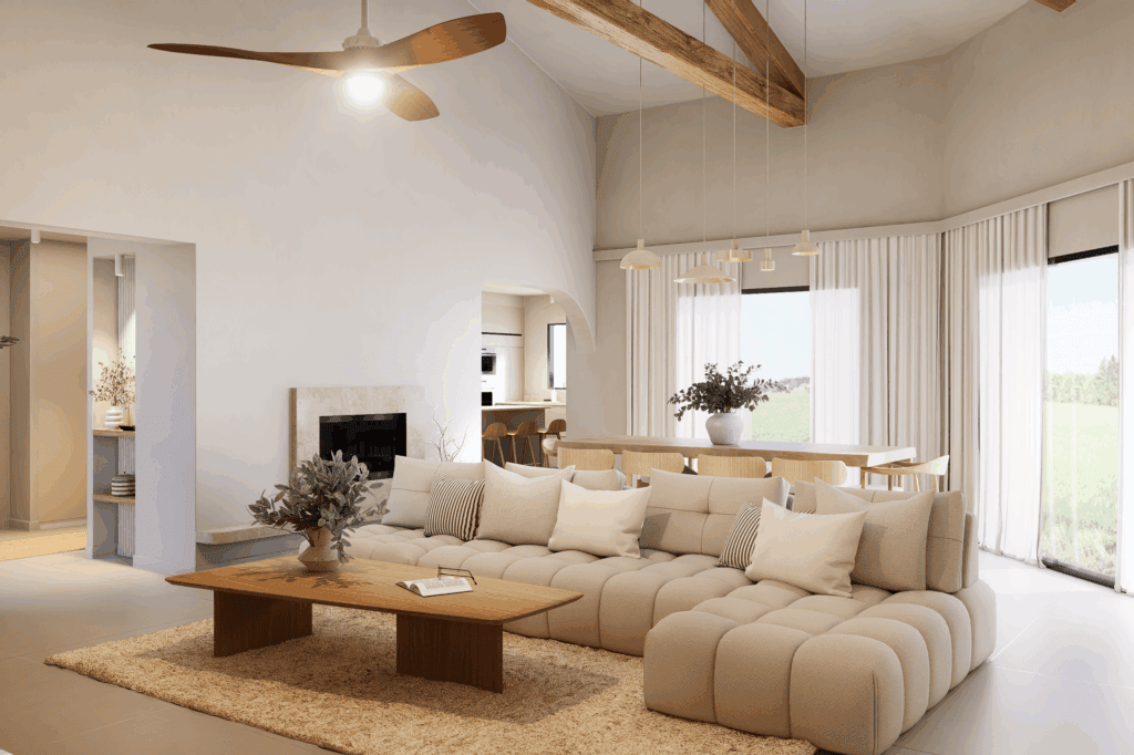 Dans ce projet d'Aurélie et Stéphanie, près de Lyon, le salon et la cuisine sont séparé par une ouverture arrondie sur la moitié droite, pour un passage élégant semi-ouvert