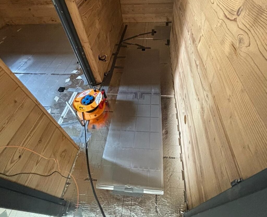 pose de plancher électrique sous parquet