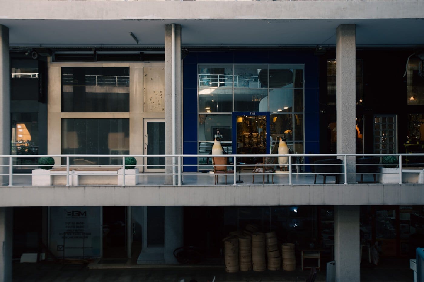 Modern building facade with blue and white sections.